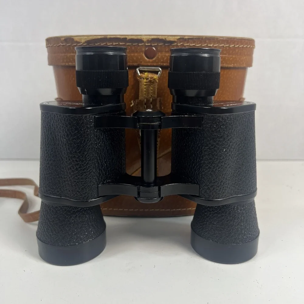 Vintage 50s-60s Tasco binoculars featuring 